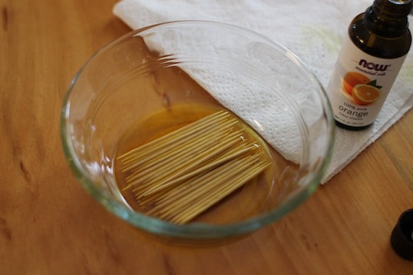 Diy flavored toothpicks soaking in Glass dish. 