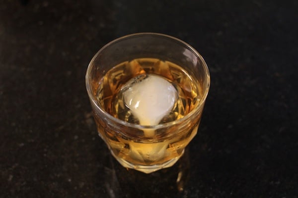 Whiskey glass with ice ball. 