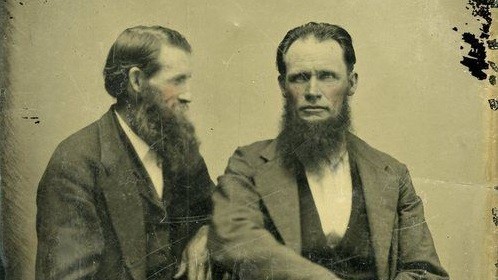 two vintage gentlemen with long beards portrait