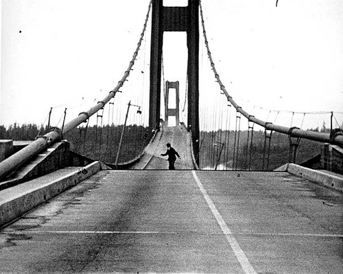 Vintage bridge after earthquake crooked and shaken.