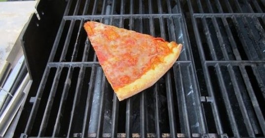 Reheating pizza on a grill is the best way to revive leftovers.