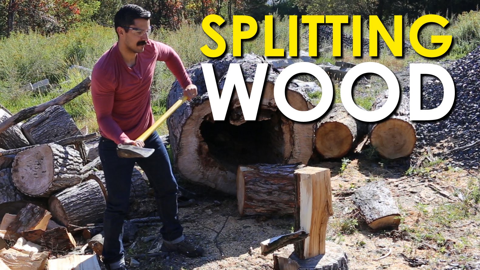 A man is splitting wood.
