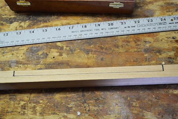 Inserting the nails on wood with the help of measuring footer.