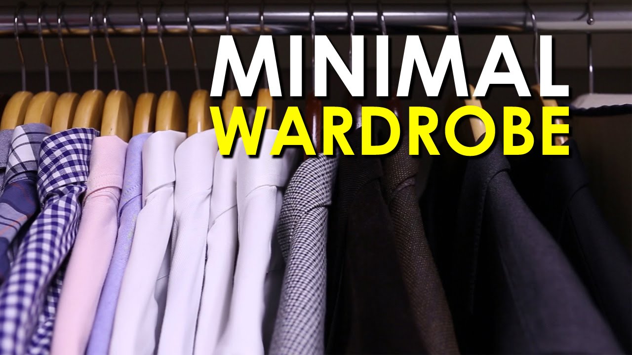A minimal wardrobe displayed on a rack of clothes.