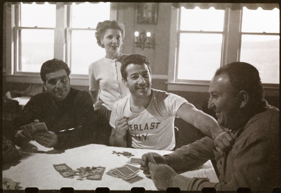 Vintage family playing Card at Table. 