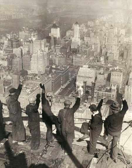 Vintage Teel workers New York Skyscraper waving. 