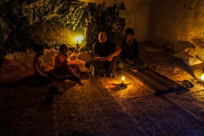 In Petra, Jordan I met a merchant selling souvenirs and she invited me stay with her and her family in their 2000-year-old cave. I ate dinner, played card games, chatted over candle light, and slept there. I was carrying everything I owned with me, so I didn't have to worry about all of my luggage back at the hostel being safe when I didn't come back.