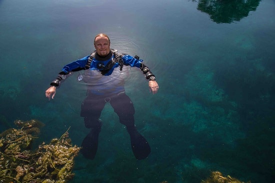 Frederick "Fritz" Hansel man underwater archaeologist in water.