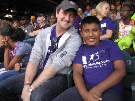 Volunteering sitting in the stadium.