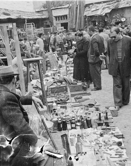 Vintage men in the market of antique things in greece. 