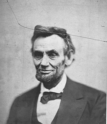 Abraham Lincoln wearing tuxedo. 