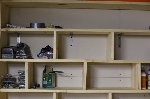 Garage cubby holes organization.