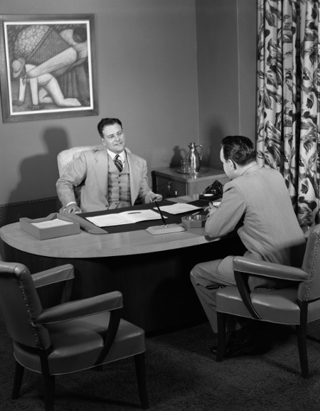 Vintage job interview 1950s.