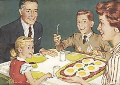 The family wrong sits at the table and eats breakfast.