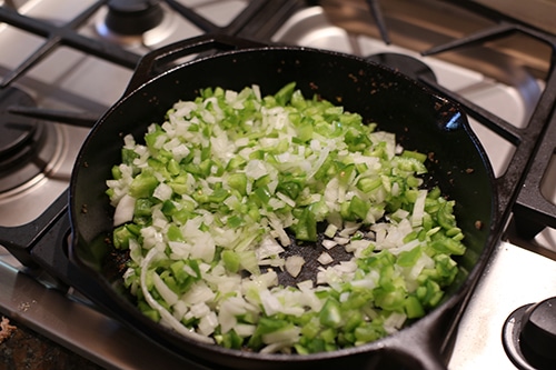 Sauteing fying onions and bell peppers cast iron.