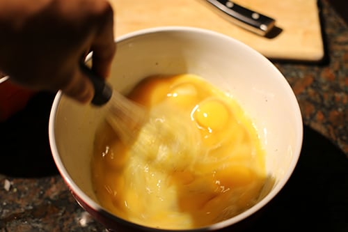 Mix eggs with milk salt pepper scramble