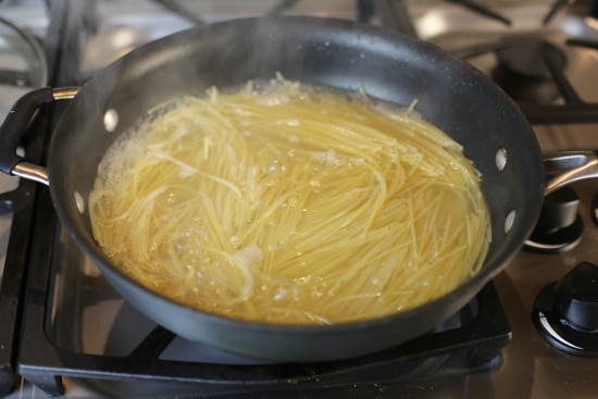 Pasta boiling in deep Skillet Pan.