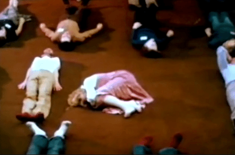 Erhard Seminars training 1970s rolling on floor screaming.