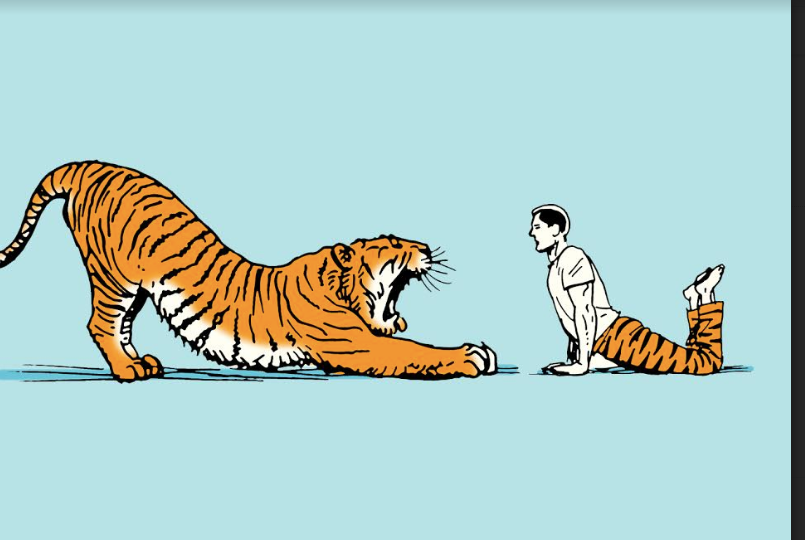 A man is doing morning stretching with a tiger.