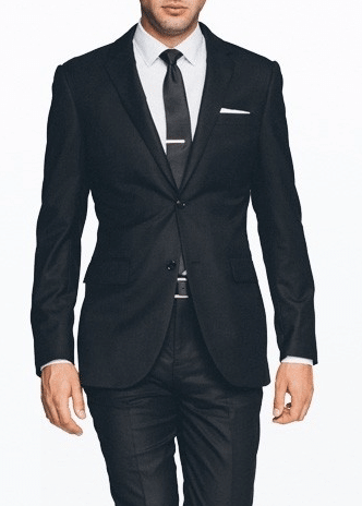 A black suit with black tie. 