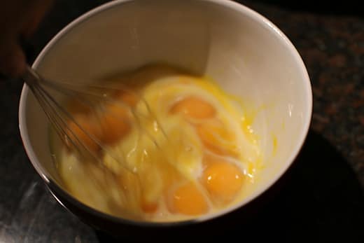 Mixing Eggs and Milk in bowl.
