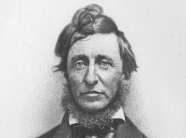 A black and white photo of a man with a beard, reminiscent of Henry David Thoreau.