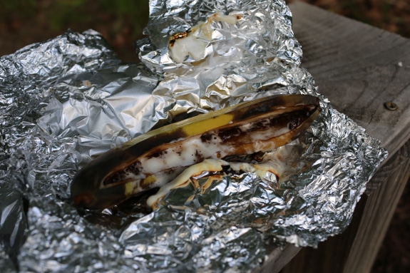 Banana boat campfire dessert in tin foil.