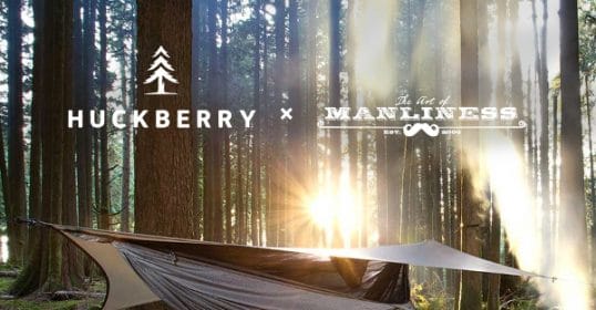 A hammock in the woods showcasing the benefits of huckberry x manliness.