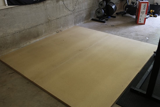 Particle Board laying on the Floor.