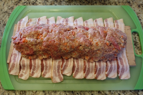 Place and shape the loaf on beacon wrap in a tray.