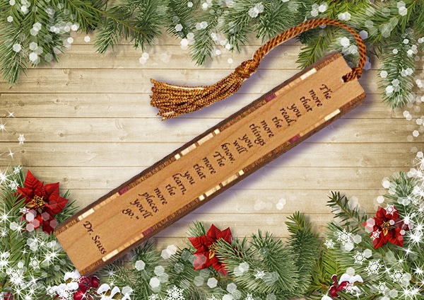 Wooden bookmark on decorated table.
