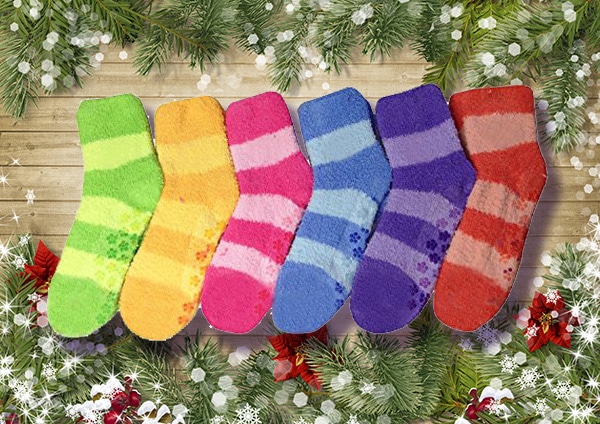  Three pairs of mamia fuzzy slipper socks for women with decorated background..