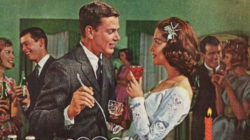 On their special day, the bride and groom make their first impression by sharing a drink from the punch bowl.