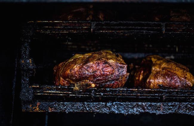 Bbq pork butt in smoker.