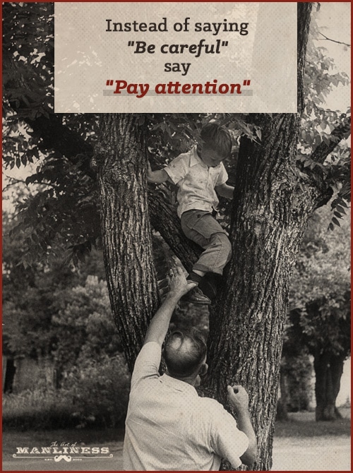 vintage dad helping boy climb tree 