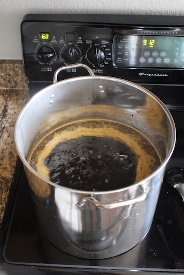 Homebrew beer wort boiling on stove top.