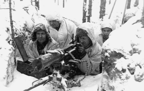 finnish soldiers aiming looking through sight of large gun wwii