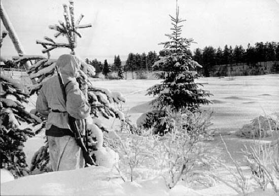 finnish soldiers looking across winter landscape wwii