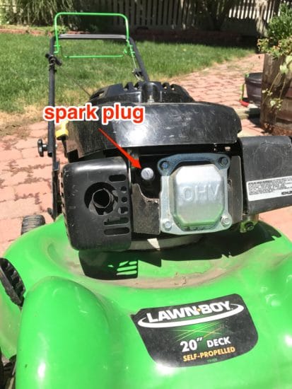 How to locate spark plug on a lawn mower.