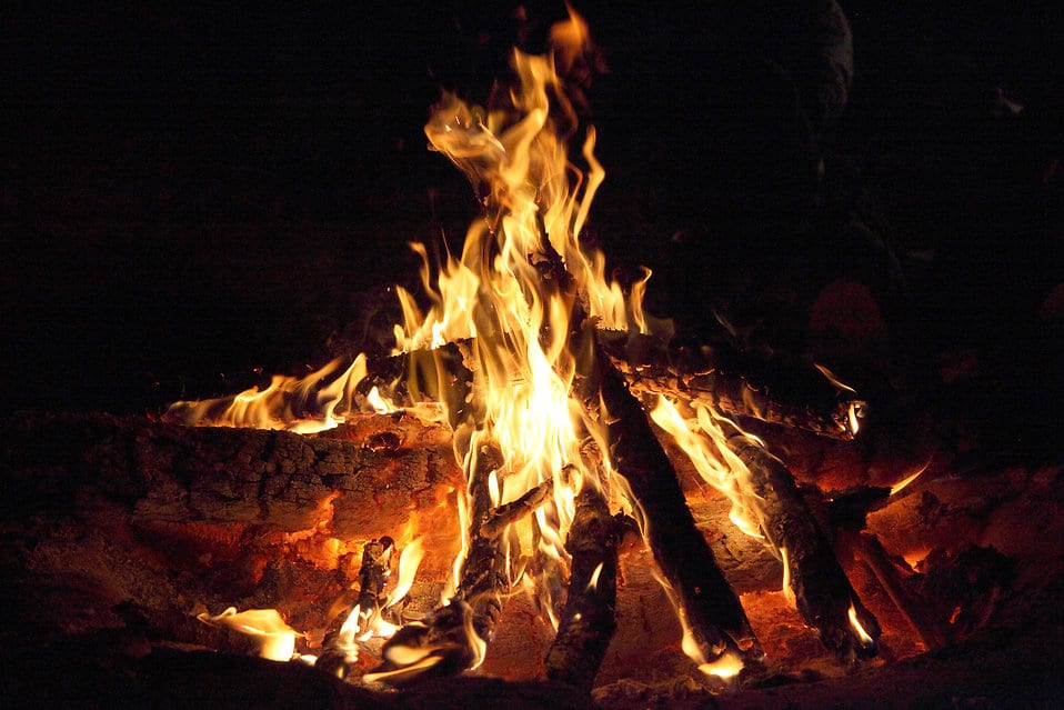 Roaring campfire at night. 