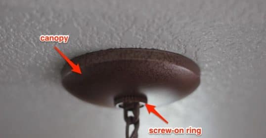 How to hang a light fixture on a ceiling with the keywords 'light fixture'.