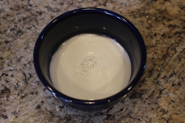 Mixing baking soda with glue homemade diy slime.