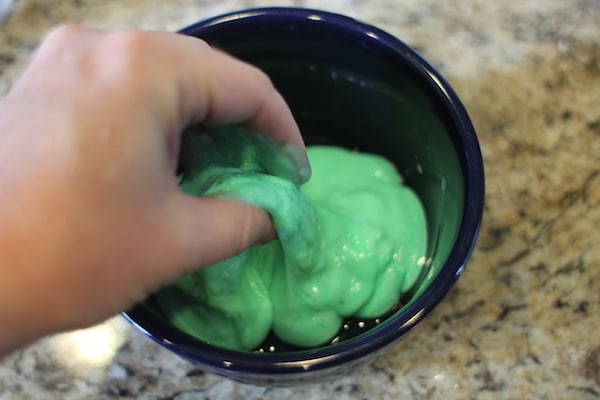 Homemade diy green slime for kids.