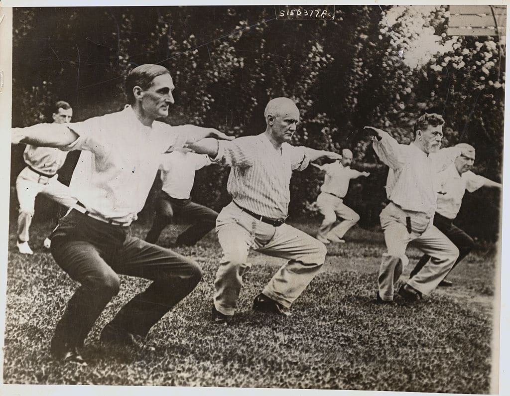 President woodrow wilson's cabinet members exercising outside. 