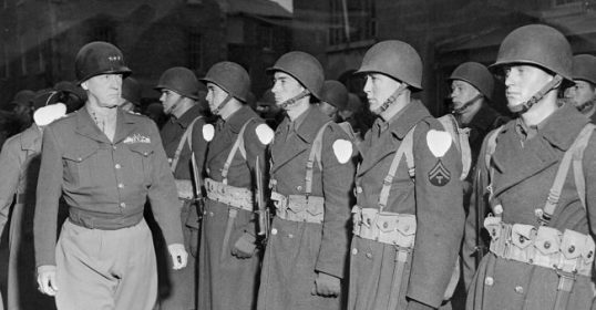 A group of men in uniform standing next to each other, never making a mistake.