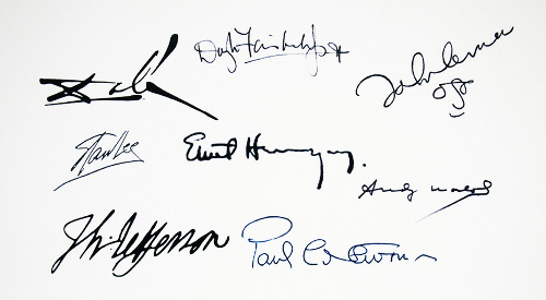 A unique collection of handwritten signatures on a white background.