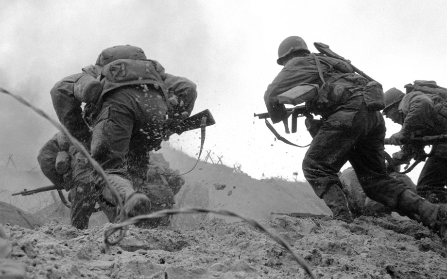 Vintage soldiers going over the hill into battle. 