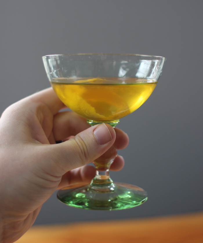 Vesper martini james bond cocktail in champagne glass.