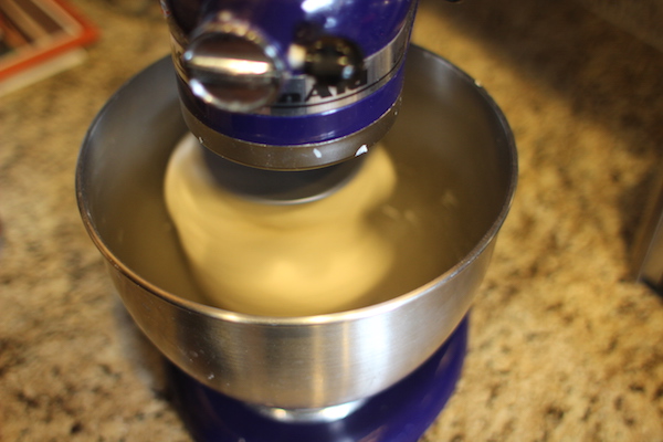 Electric mixer, mixing the ingredients for making a dough.