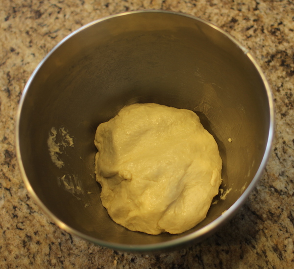 Rough dough placed in a bowl.